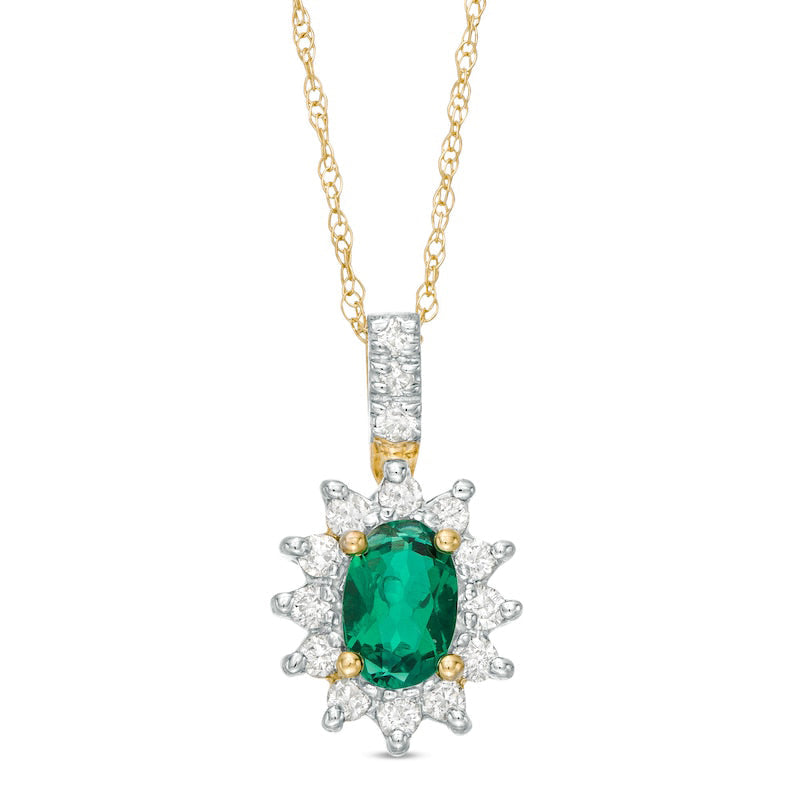Oval Lab-Created Emerald and 0.2 CT. T.W. Diamond Starburst Frame Pendant in 10K Yellow Gold