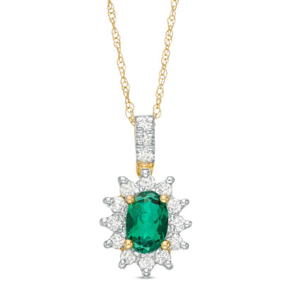 Oval Lab-Created Emerald and 0.2 CT. T.W. Diamond Starburst Frame Pendant in 10K Yellow Gold
