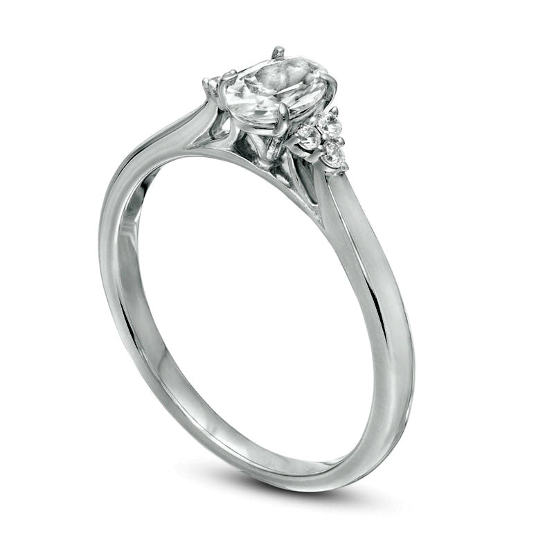 0.63 CT. T.W. Oval Natural Diamond Tri-Sides Engagement Ring in Solid 14K White Gold