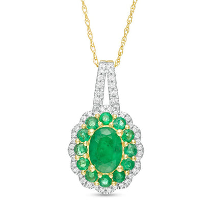 Oval Emerald and 0.17 CT. T.W. Natural Diamond Double Scallop Frame Pendant in 10K Yellow Gold