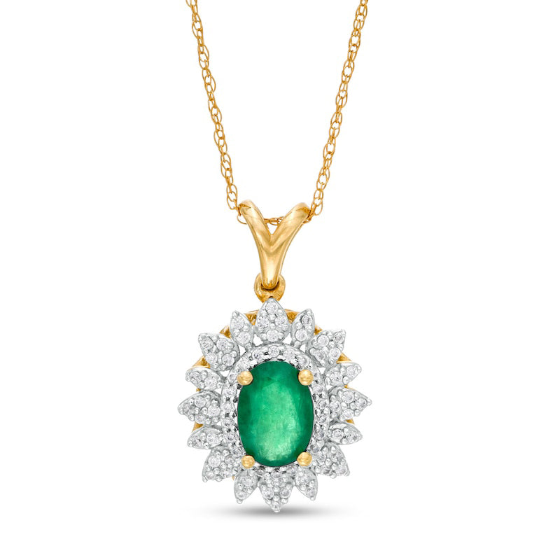 Oval Emerald and 0.2 CT. T.W. Natural Diamond Flower Frame Pendant in 10K Yellow Gold
