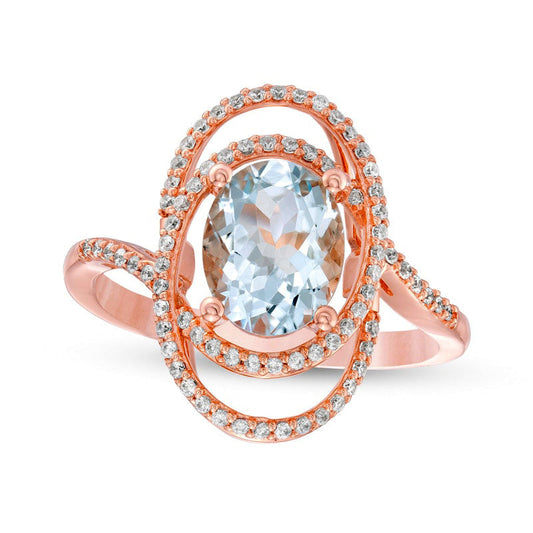 Oval Aquamarine and 0.25 CT. T.W. Natural Diamond Orbit Frame Bypass Shank Ring in Solid 10K Rose Gold
