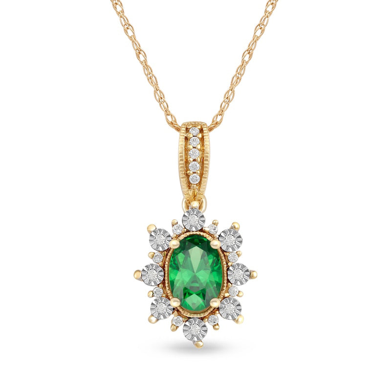 Oval Emerald and 0.07 CT. T.W. Natural Diamond Sunburst Frame Antique Vintage-Style Drop Pendant in 10K Yellow Gold