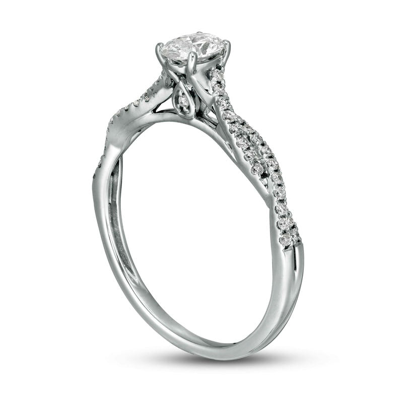 0.50 CT. T.W. Oval Natural Diamond Twist Engagement Ring in Solid 14K White Gold