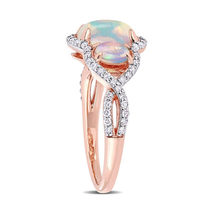 Oval Cabochon Opal and 0.33 CT. T.W. Natural Diamond Frame Three Stone Twist Shank Ring in Solid 10K Rose Gold