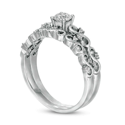 0.25 CT. T.W. Natural Diamond Infinity Bridal Engagement Ring Set in Solid 10K White Gold