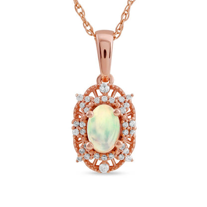 Oval Opal and 0.1 CT. T.W. Natural Diamond Bead Frame Sunburst Pendant in 10K Rose Gold