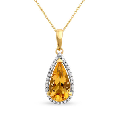 Pear-Shaped Citrine and 0.1 CT. T.W. Natural Diamond Frame Pendant in 10K Yellow Gold