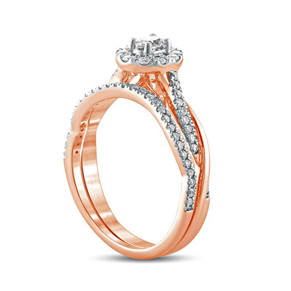 0.50 CT. T.W. Oval Natural Diamond Frame Twist Shank Bridal Engagement Ring Set in Solid 10K Rose Gold