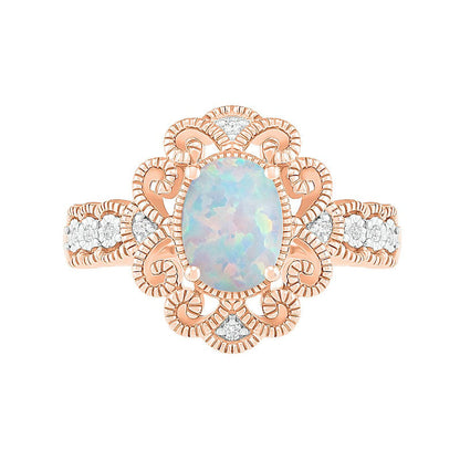 Oval Lab-Created Opal and 0.05 CT. T.W. Diamond Scroll Frame Scallop Shank Antique Vintage-Style Ring in Solid 10K Rose Gold