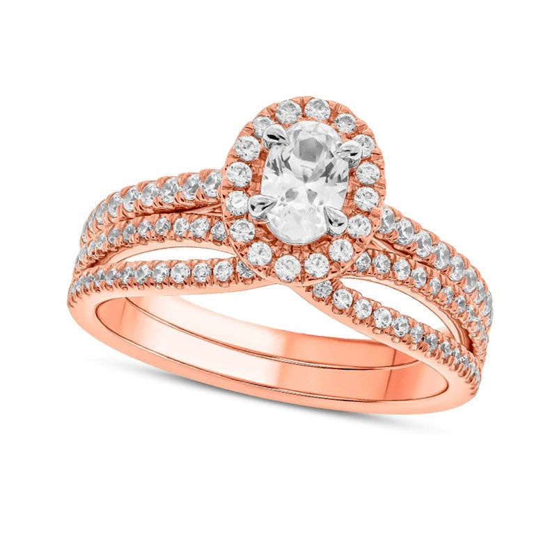 1.0 CT. T.W. Oval Natural Diamond Frame Crossover Bridal Engagement Ring Set in Solid 10K Rose Gold