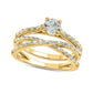 0.75 CT. T.W. Baguette and Round Natural Diamond Crossover Bridal Engagement Ring Set in Solid 10K Yellow Gold