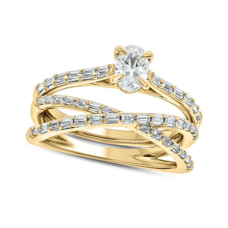 0.75 CT. T.W. Oval and Baguette Natural Diamond Crossover Bridal Engagement Ring Set in Solid 10K Yellow Gold