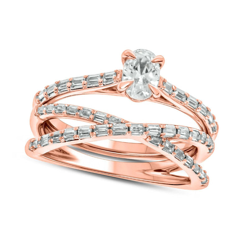 0.75 CT. T.W. Oval and Baguette Natural Diamond Crossover Bridal Engagement Ring Set in Solid 10K Rose Gold