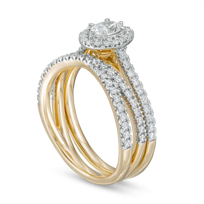 1.0 CT. T.W. Oval Natural Diamond Frame Crossover Bridal Engagement Ring Set in Solid 14K Gold