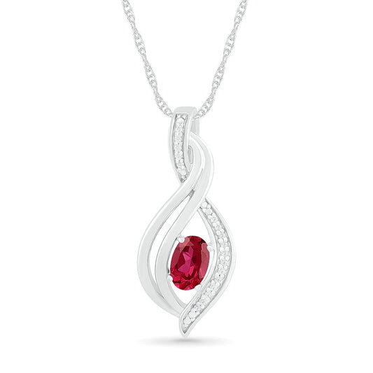 Oval Lab-Created Ruby and 0.05 CT. T.W. Diamond Flame Drop Pendant in Sterling Silver