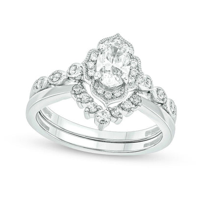 0.75 CT. T.W. Oval Natural Diamond Frame Antique Vintage-Style Bridal Engagement Ring Set in Solid 14K White Gold (I/I2)