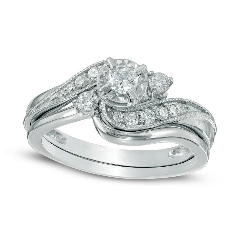 Previously Owned - 0.38 CT. T.W. Slant Three Stone Bridal Engagement Ring Set in Solid 10K White Gold