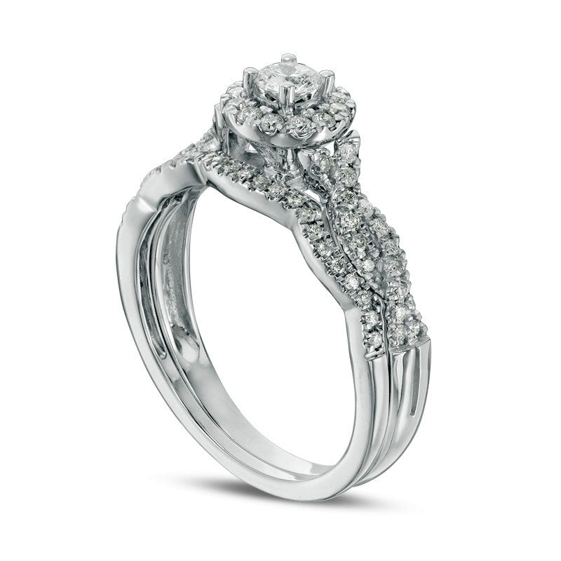 Previously Owned - 0.50 CT. T.W. Natural Diamond Frame Twist Bridal Engagement Ring Set in Solid 10K White Gold