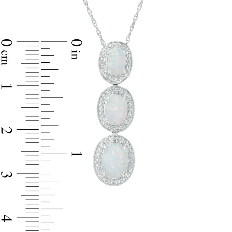 Oval Lab-Created Opal and Diamond Accent Frame Three Stone Pendant in Sterling Silver