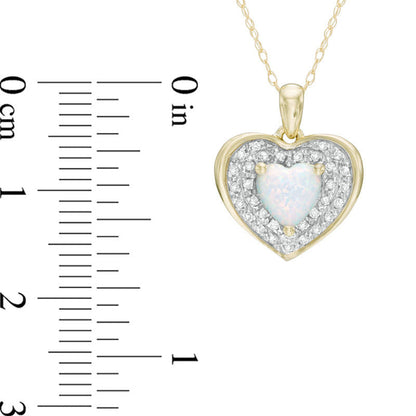 6.0mm Heart-Shaped Lab-Created Opal and 0.13 CT. T.W. Diamond Frame Heart Pendant in 10K Yellow Gold