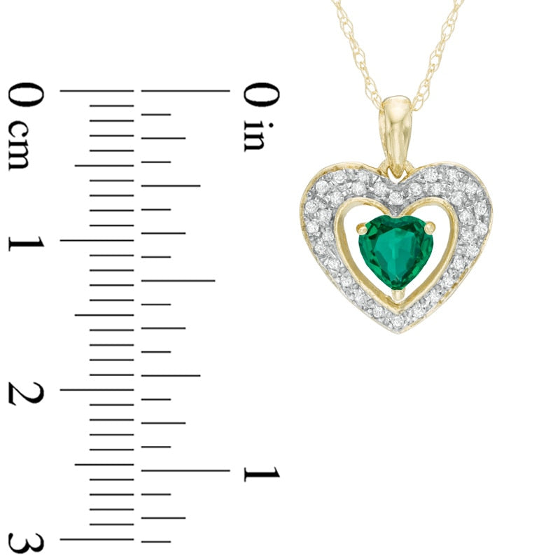 5.0mm Heart-Shaped Lab-Created Emerald and 0.13 CT. T.W. Diamond Frame Heart Pendant in 10K Yellow Gold