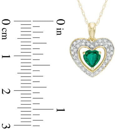5.0mm Heart-Shaped Lab-Created Emerald and 0.13 CT. T.W. Diamond Frame Heart Pendant in 10K Yellow Gold