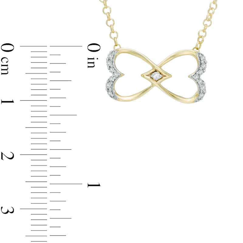 0.1 CT. T.W. Natural Diamond Heart-Shaped Infinity Pendant in Sterling Silver and 14K Gold Plate