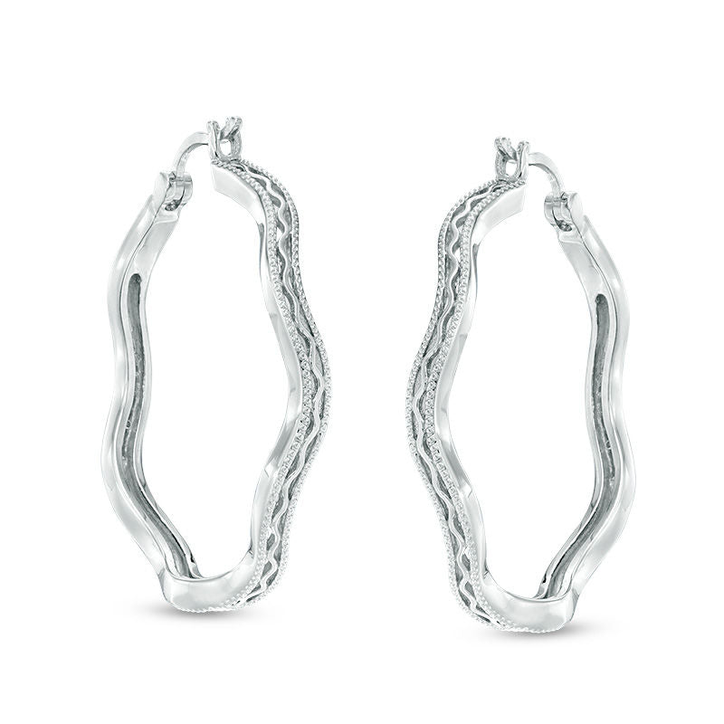 0.1 CT. T.W. Diamond Wavy Hoop Earrings in Sterling Silver