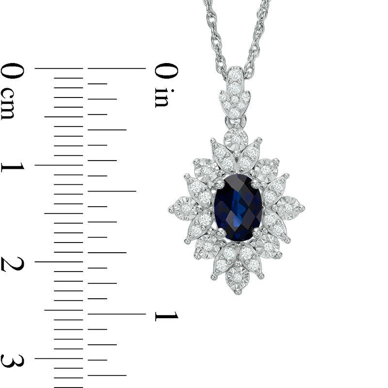 Oval Lab-Created Blue and White Sapphire Starburst Frame Pendant in Sterling Silver