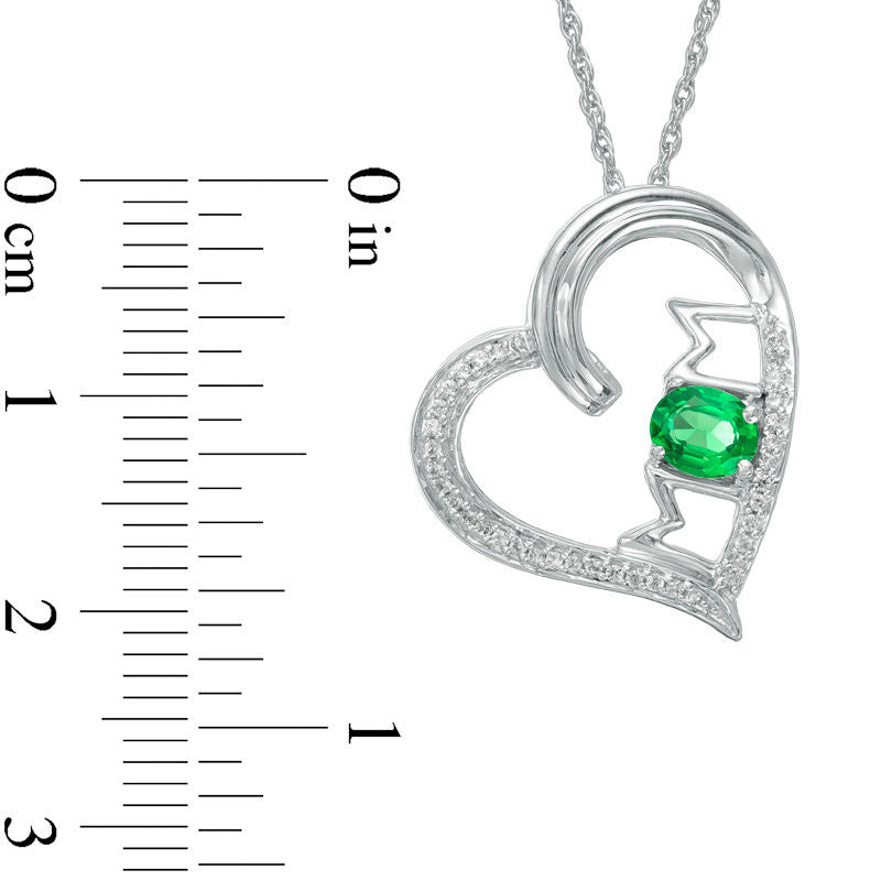 Oval Lab-Created Emerald and 0.1 CT. T.W. Diamond Tilted Heart with MOM" Pendant in Sterling Silver"