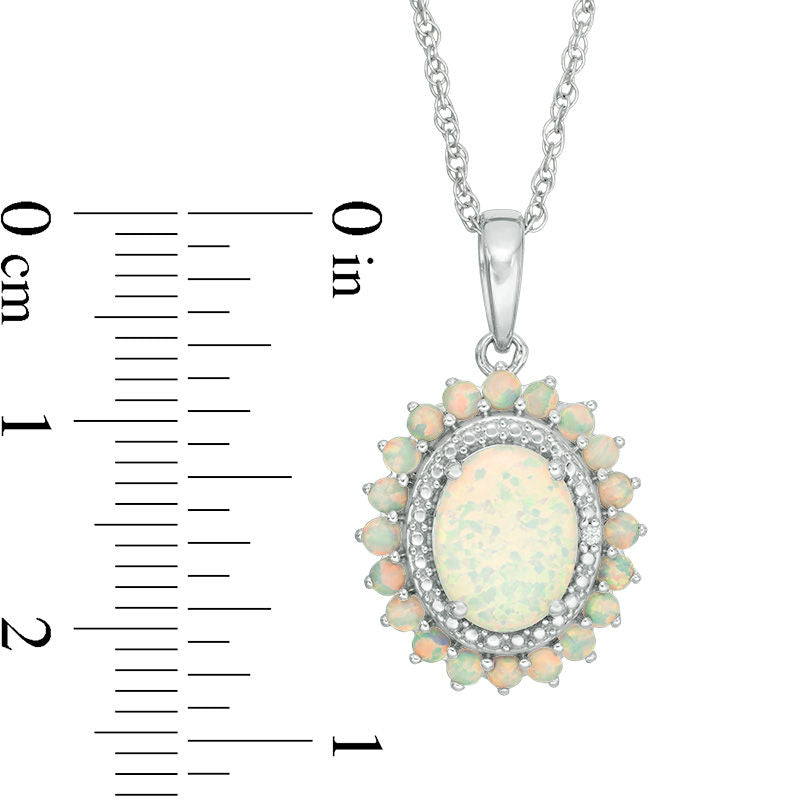 Oval Lab-Created Opal and White Sapphire Sunburst Frame Pendant in Sterling Silver