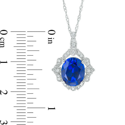 Oval Lab-Created Blue Sapphire and 0.17 CT. T.W. Diamond Antique Vintage-Style Vine Frame Pendant in 10K White Gold