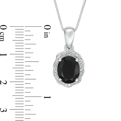 Oval Onyx and Natural Diamond Accent Pinwheel Frame Pendant in Sterling Silver