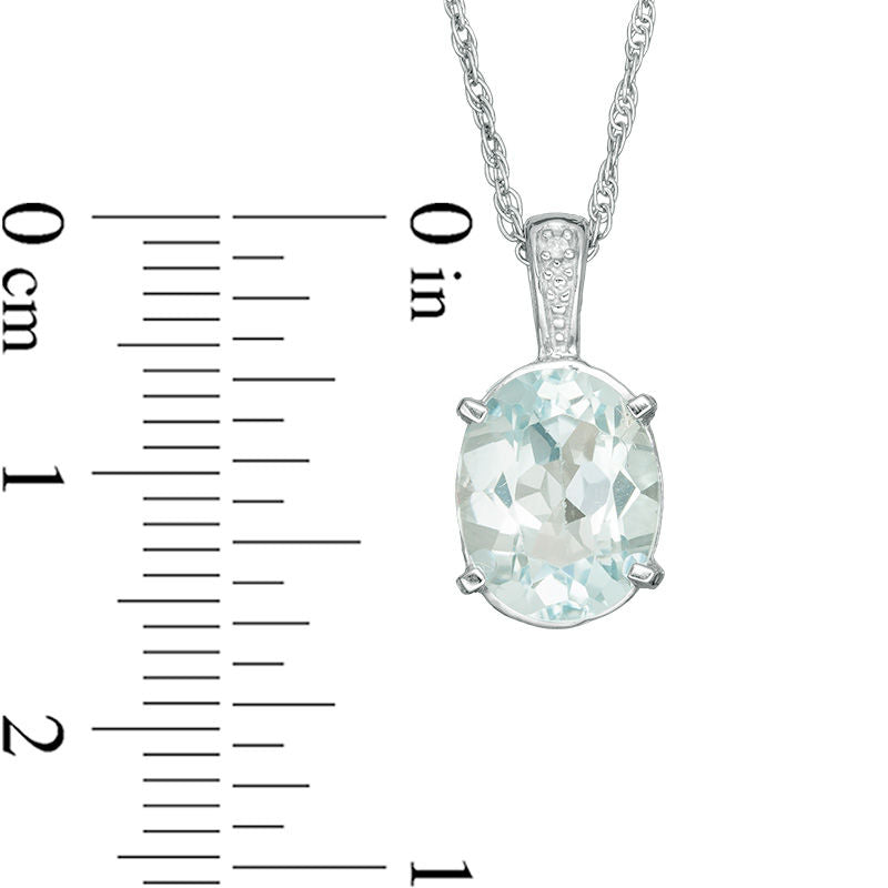 Oval Blue Topaz and Natural Diamond Accent Bale Drop Pendant in Sterling Silver