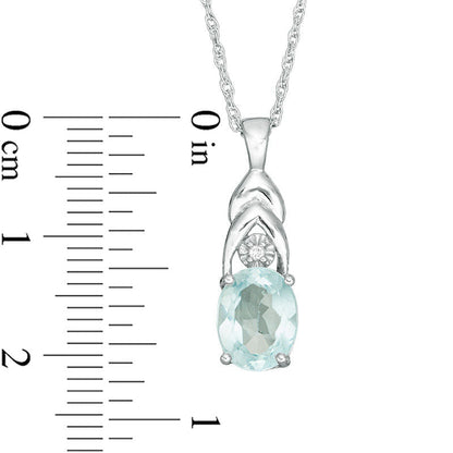 Oval Blue Topaz and Natural Diamond Accent Layered Pendant in Sterling Silver