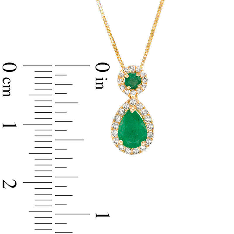 Emerald and 0.17 CT. T.W. Natural Diamond Frame Drop Pendant in 10K Yellow Gold