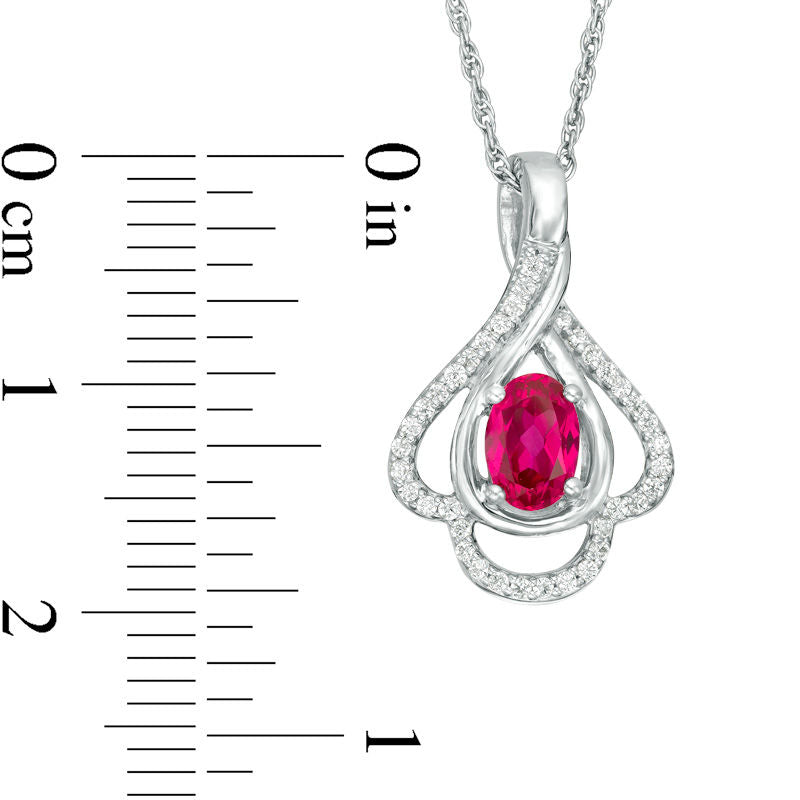 Oval Lab-Created Ruby and 0.17 CT. T.W. Diamond Teardrop Frame Leaf Pendant in 10K White Gold