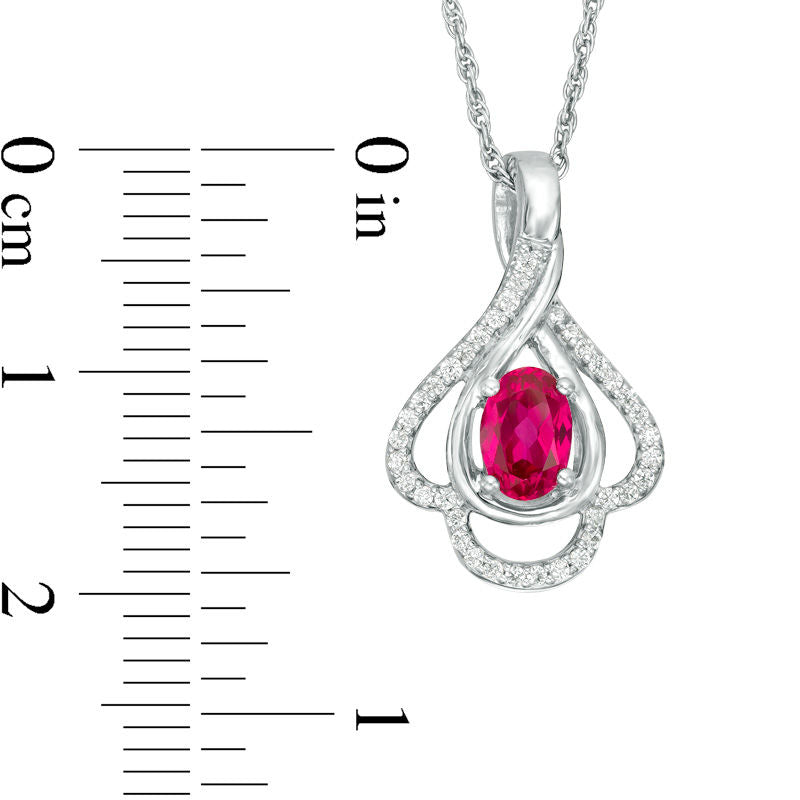 Oval Lab-Created Ruby and 0.17 CT. T.W. Diamond Teardrop Frame Leaf Pendant in 10K White, Yellow or Rose Gold