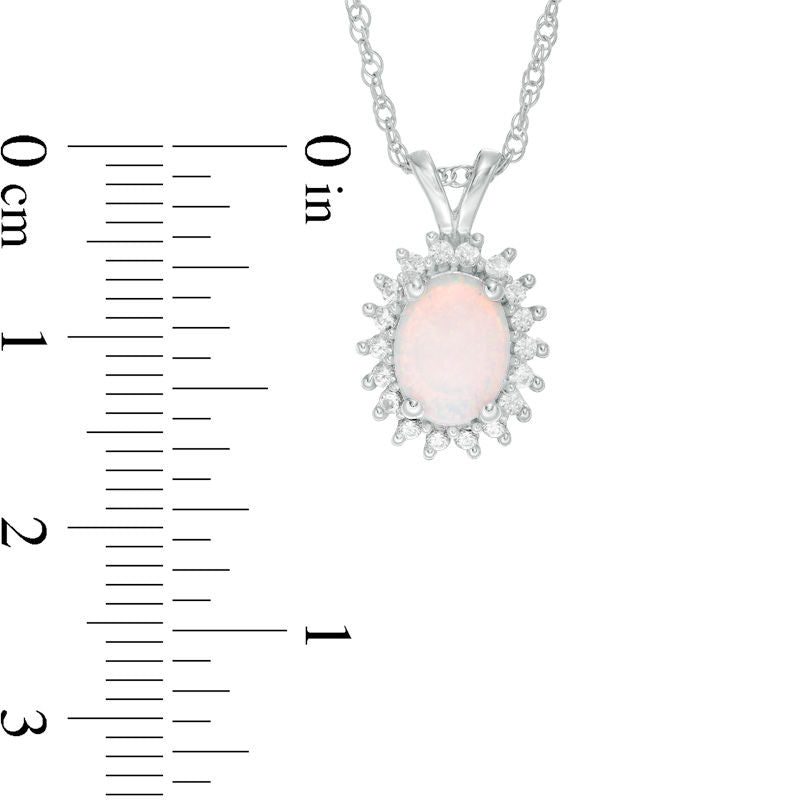 Oval Lab-Created Opal and White Sapphire Starburst Frame Pendant in Sterling Silver