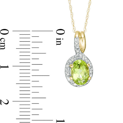 Oval Peridot and 0.05 CT. T.W. Natural Diamond Frame Bypass Pendant in 10K Yellow Gold