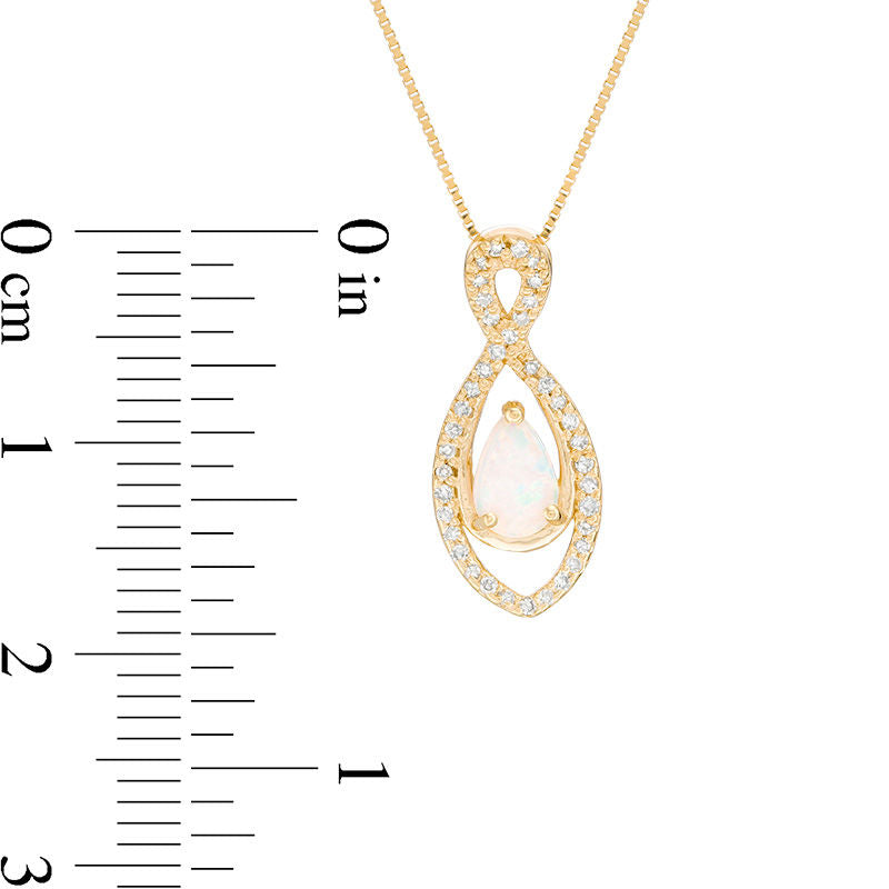 Pear-Shaped Lab-Created Opal and 0.13 CT. T.W. Diamond Infinity Pendant in 10K Yellow Gold