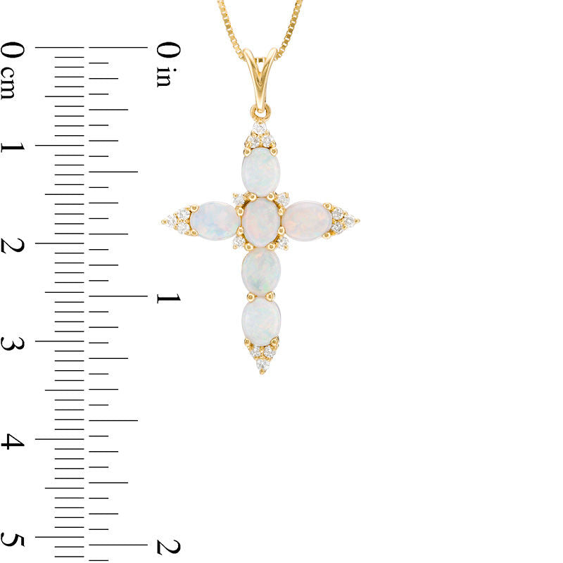 Oval Opal and 0.17 CT. T.W. Natural Diamond Trio Pointed Cross Pendant in 14K Gold