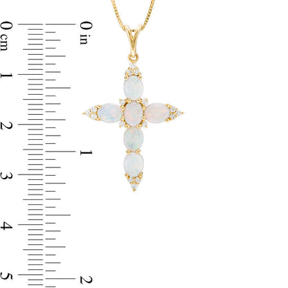Oval Opal and 0.17 CT. T.W. Natural Diamond Trio Pointed Cross Pendant in 14K Gold