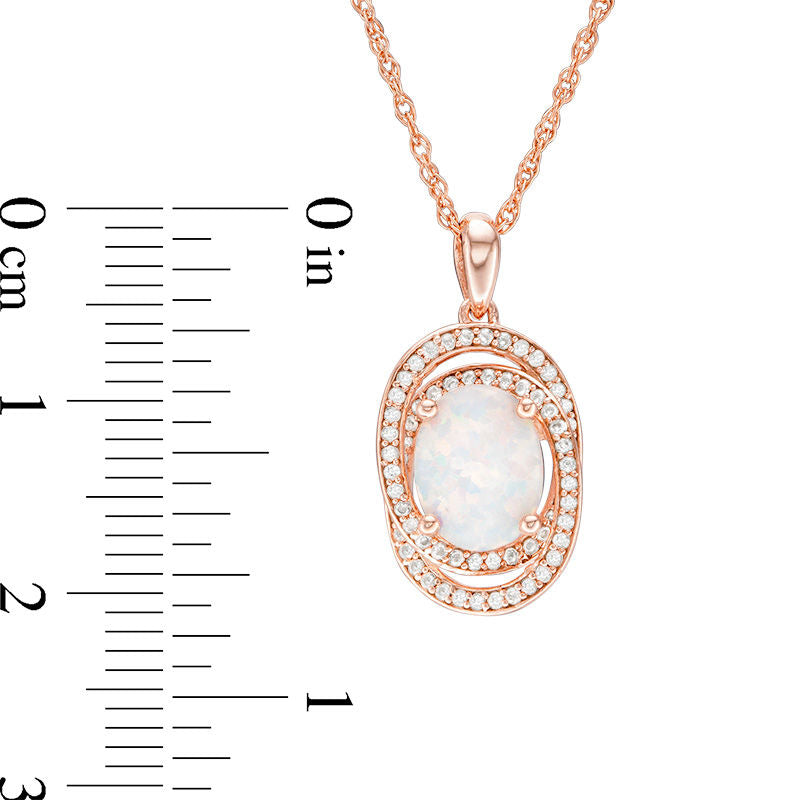 Oval Opal and 0.25 CT. T.W. Natural Diamond Orbit Frame Pendant in 10K Rose Gold
