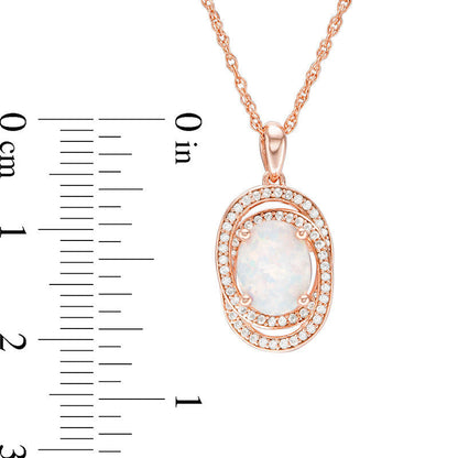 Oval Opal and 0.25 CT. T.W. Natural Diamond Orbit Frame Pendant in 10K Rose Gold