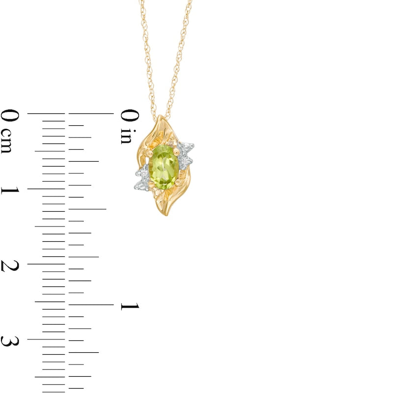 Oval Peridot and Natural Diamond Accent Flame Burst Pendant in 10K Yellow Gold