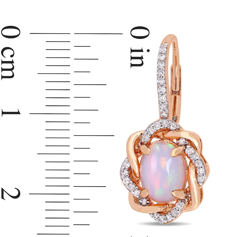 Oval Pink Opal and 0.25 CT. T.W. Diamond Twist Frame Drop Earrings in 10K Rose Gold