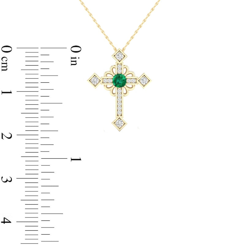 Emerald and 0.05 CT. T.W. Natural Diamond Gothic-Style Cross Pendant in 10K Yellow Gold