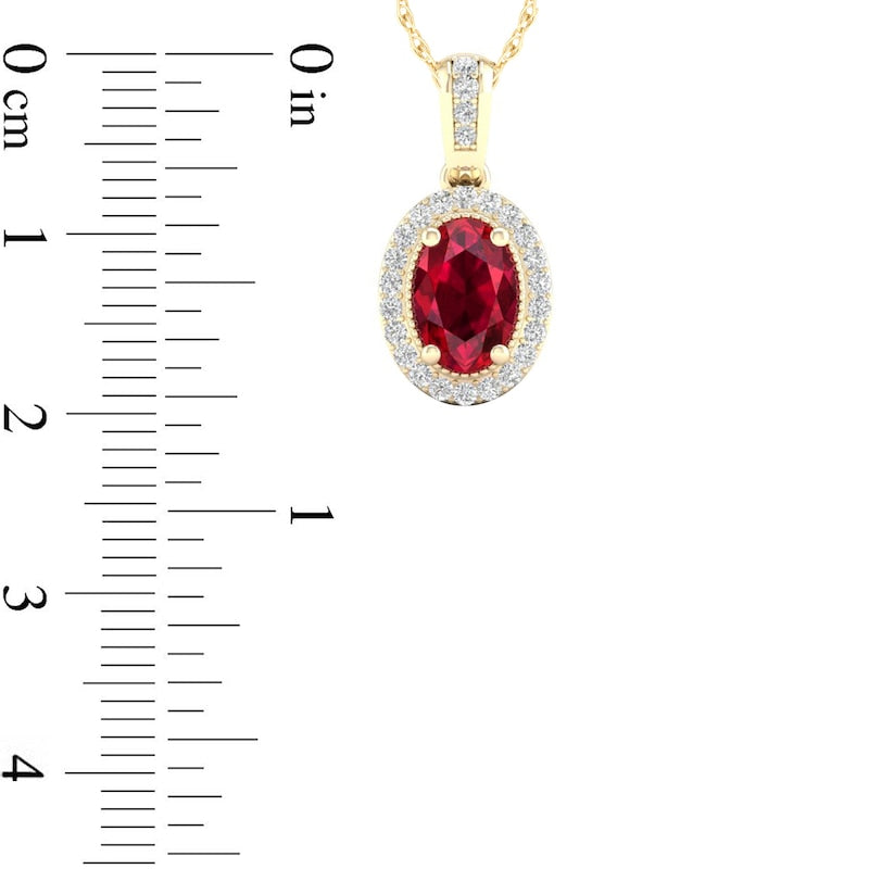 Oval Ruby and 0.07 CT. T.W. Natural Diamond Frame Pendant in 10K Yellow Gold